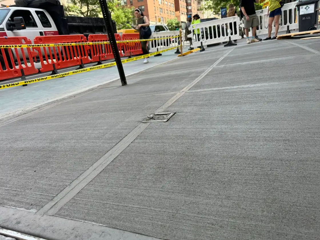 concrete sidewalk repaired nyc